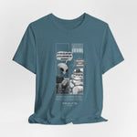 The Satisfiction t-shirt in heather deep teal — 3D mockup featuring a moody blue-green tone. No background or model.