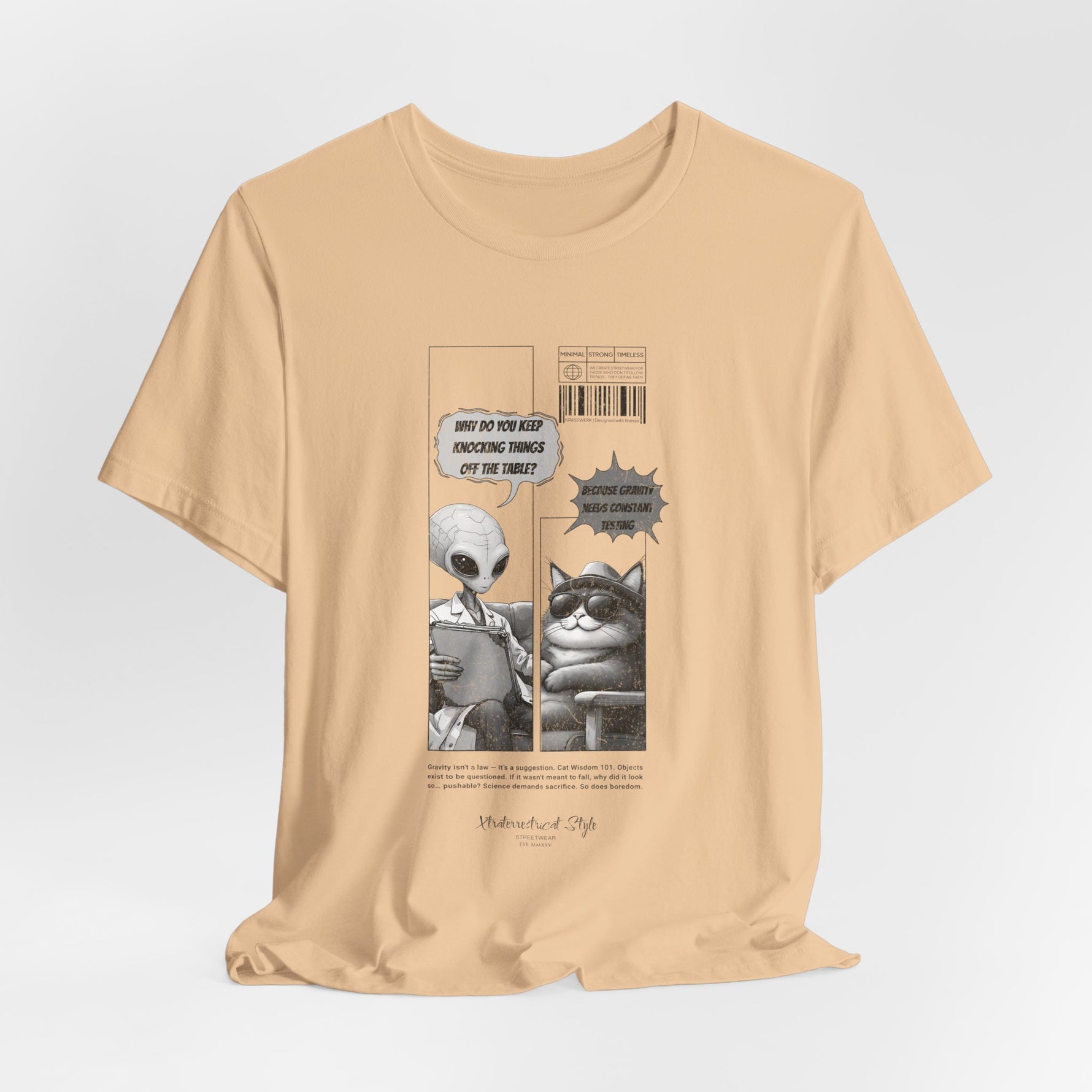 The GRAVITY t-shirt in Sand Dune — 3D mockup of sandy tan tone, printed comic visible, clean backdrop and no human figure.