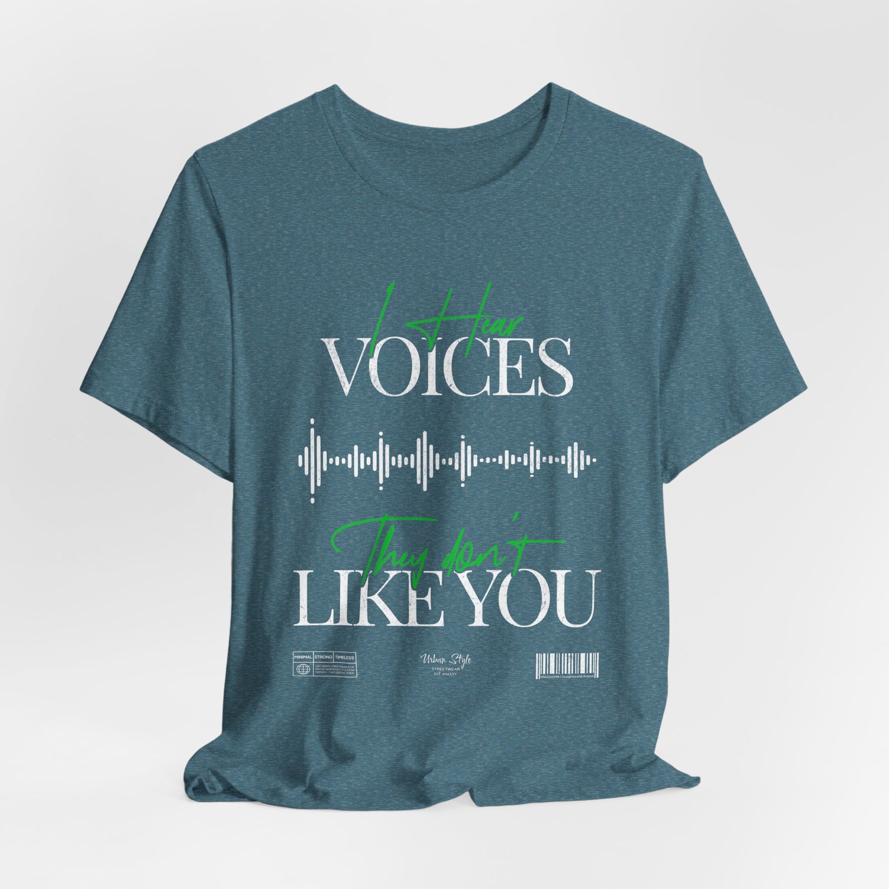 The VOICES t-shirt in Heather Deep Teal — lucid and strange, like a thought you didn’t invite.