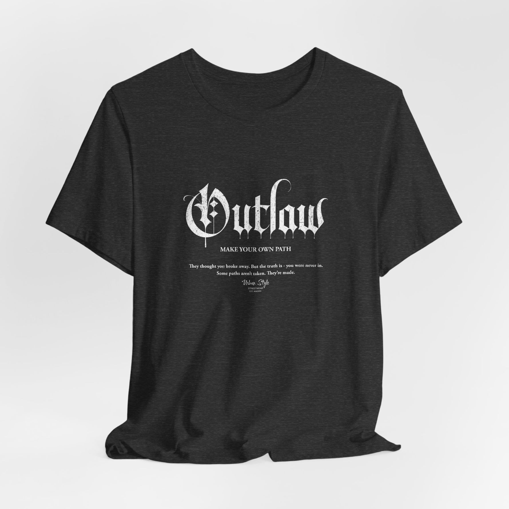 The OUTLAW t-shirt in Dark Heather Grey — silent rebel tones for the ones who never followed.