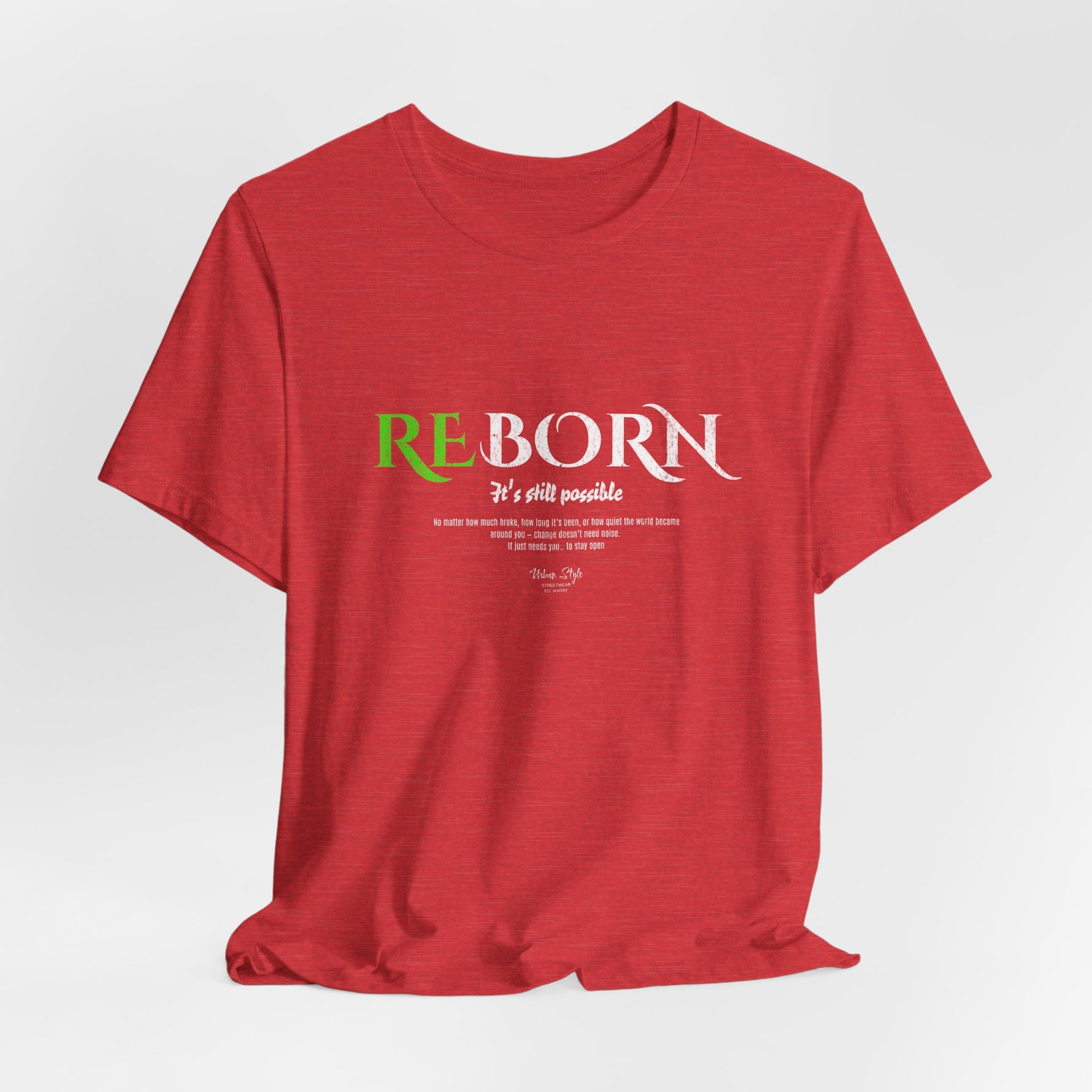 The REBORN t-shirt in Heather Red — pain transformed into power with every heartbeat.