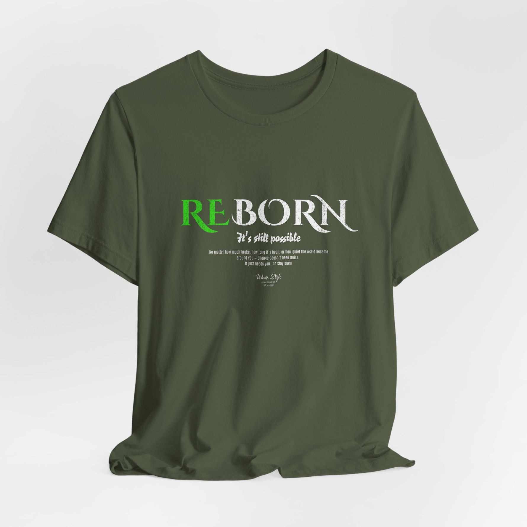 The REBORN t-shirt in Military Green — resilience dressed in calm resolve.