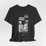 The TO RULE t-shirt in Dark Heather Grey — a deep grey shade that softens the comic’s monochrome lines.