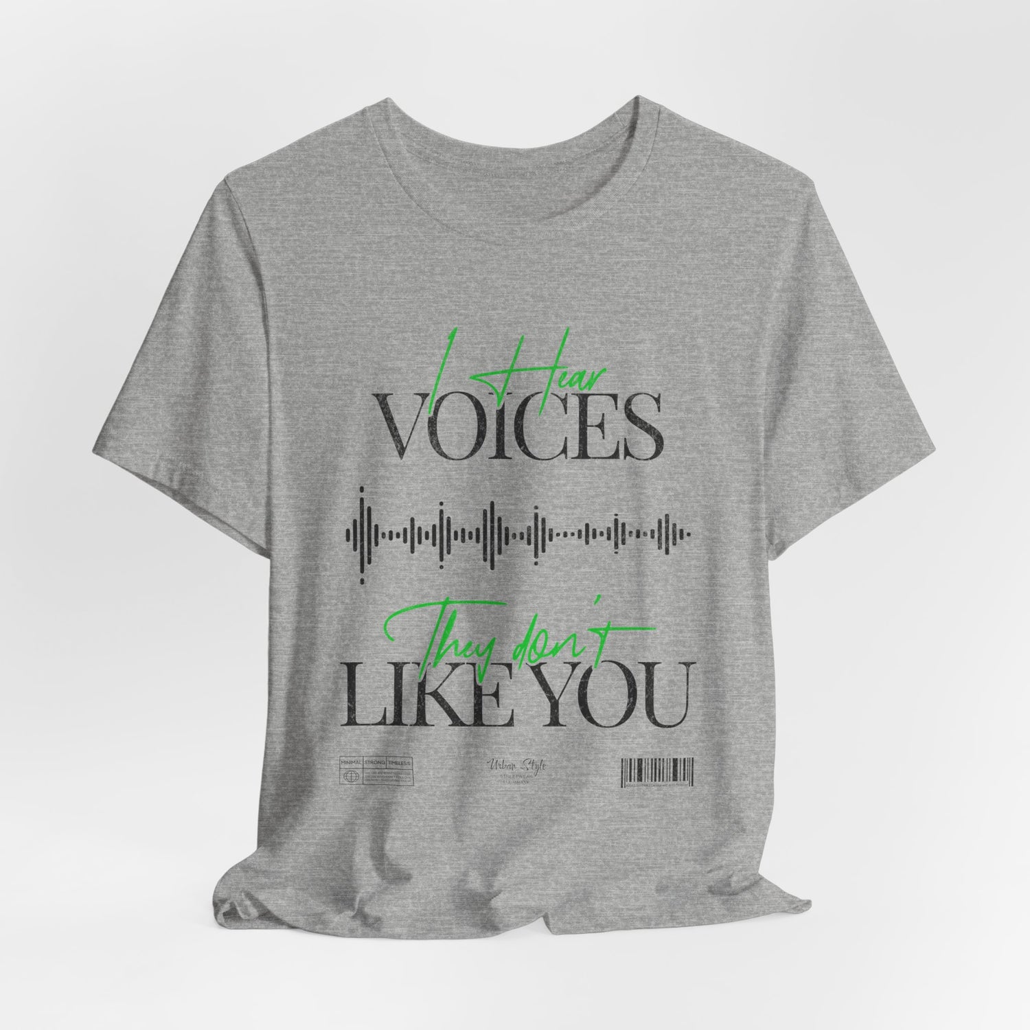 The VOICES t-shirt in Athletic Heather — cold logic masked in soft distraction.