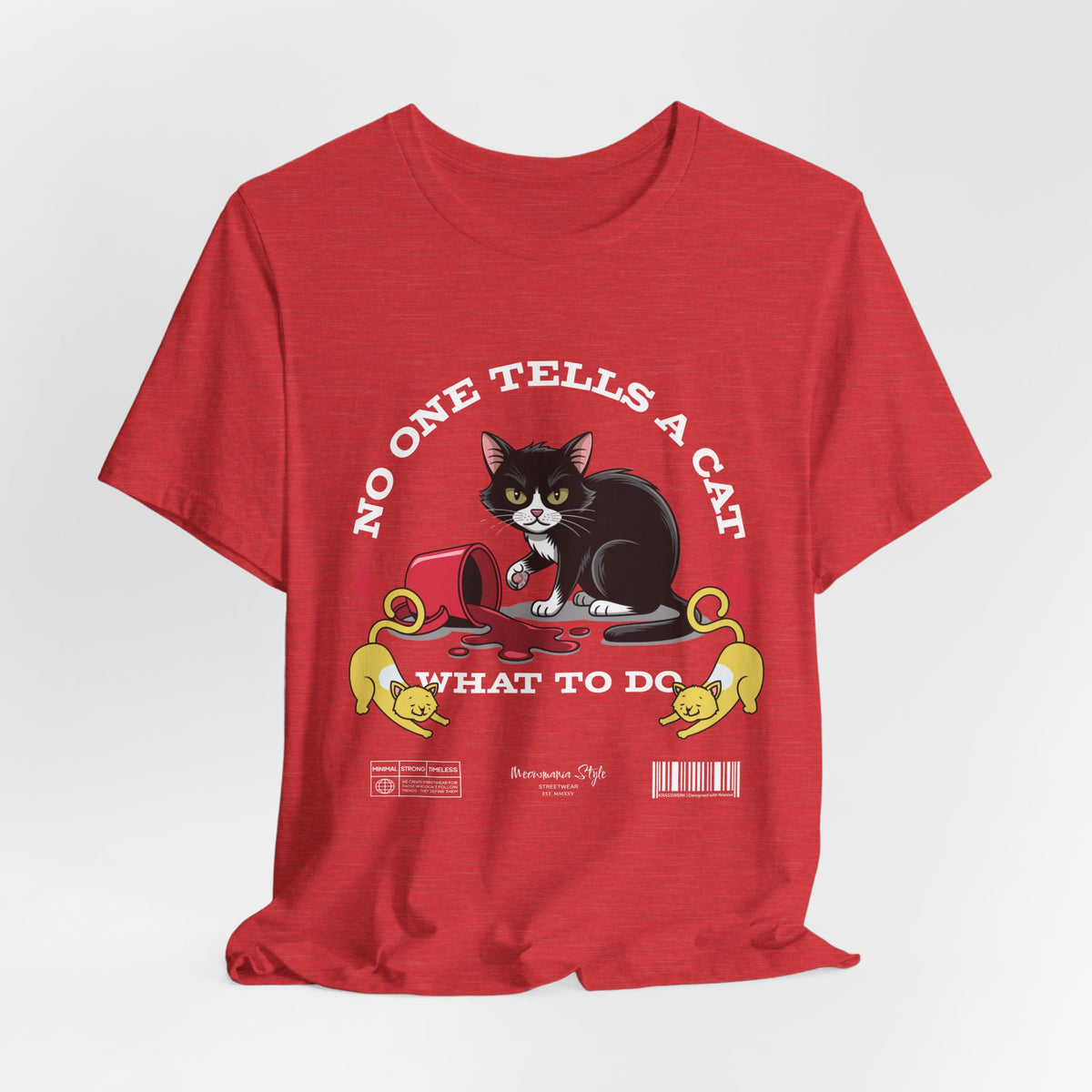 The No One Tells a Cat t-shirt in heatherred — ghost mockup showing a soft heathered red tone with no background or model.