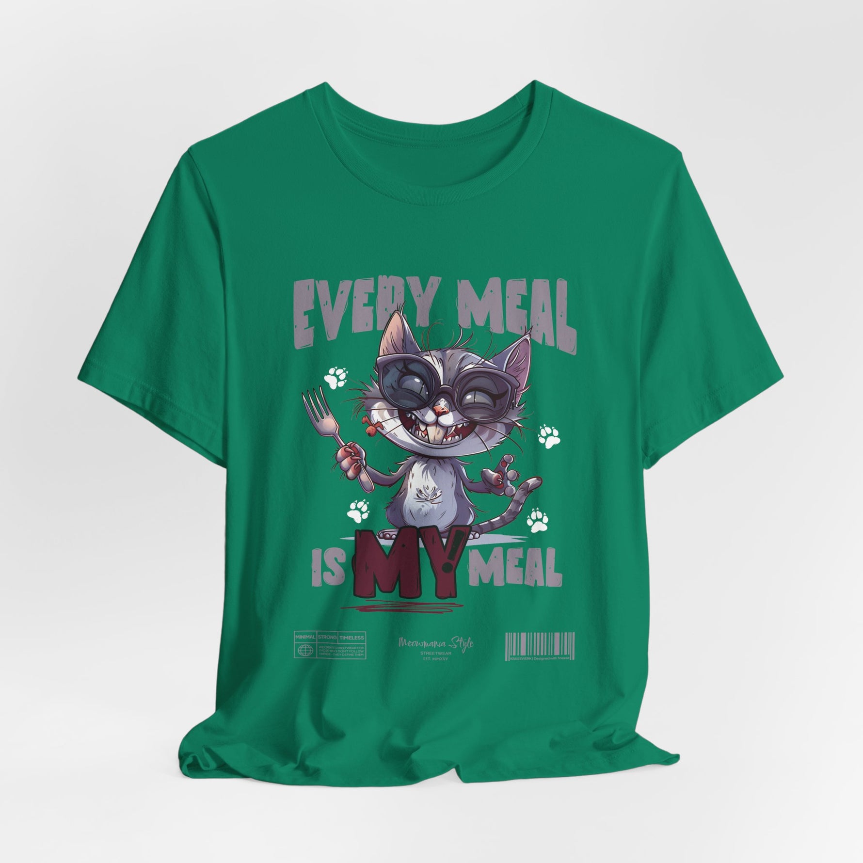 The EVERY MEAL IS MY MEAL t-shirt in kelly — a vibrant green that adds quirky contrast to the cat’s expression.