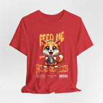 The FEED ME t-shirt in heatherred — fiery and urgent, perfectly echoing the kitten’s demand.
