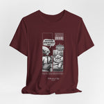 The CARDIO t-shirt in Maroon — 3D mockup of the deep red Maroon variant with comic artwork. Design centered. No model, no background.