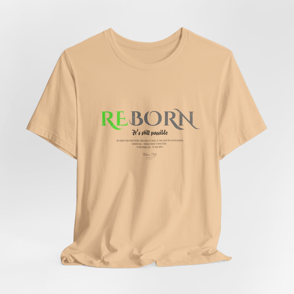 The REBORN t-shirt in Sand Dune — weathered change in soft endurance.