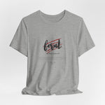 The FERAL t-shirt in Athletic Heather — untamed thoughts in neutral tones.