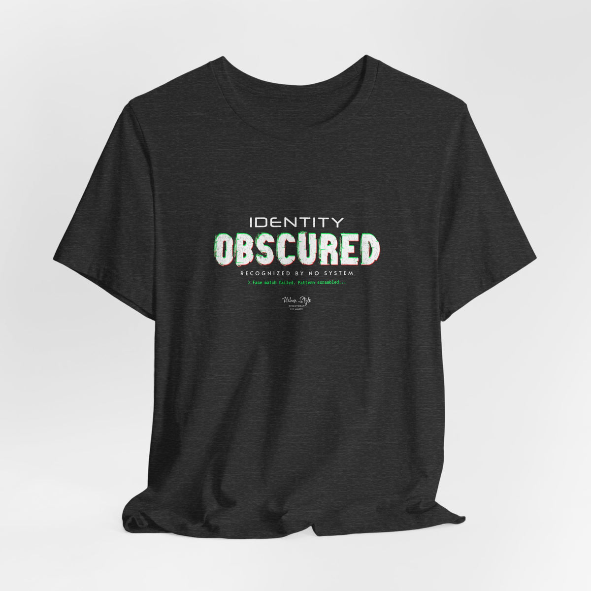 The IDENTITY OBSCURED t-shirt in Dark Heather Grey — 3D mockup of a textured grey shirt. No background. No model.
