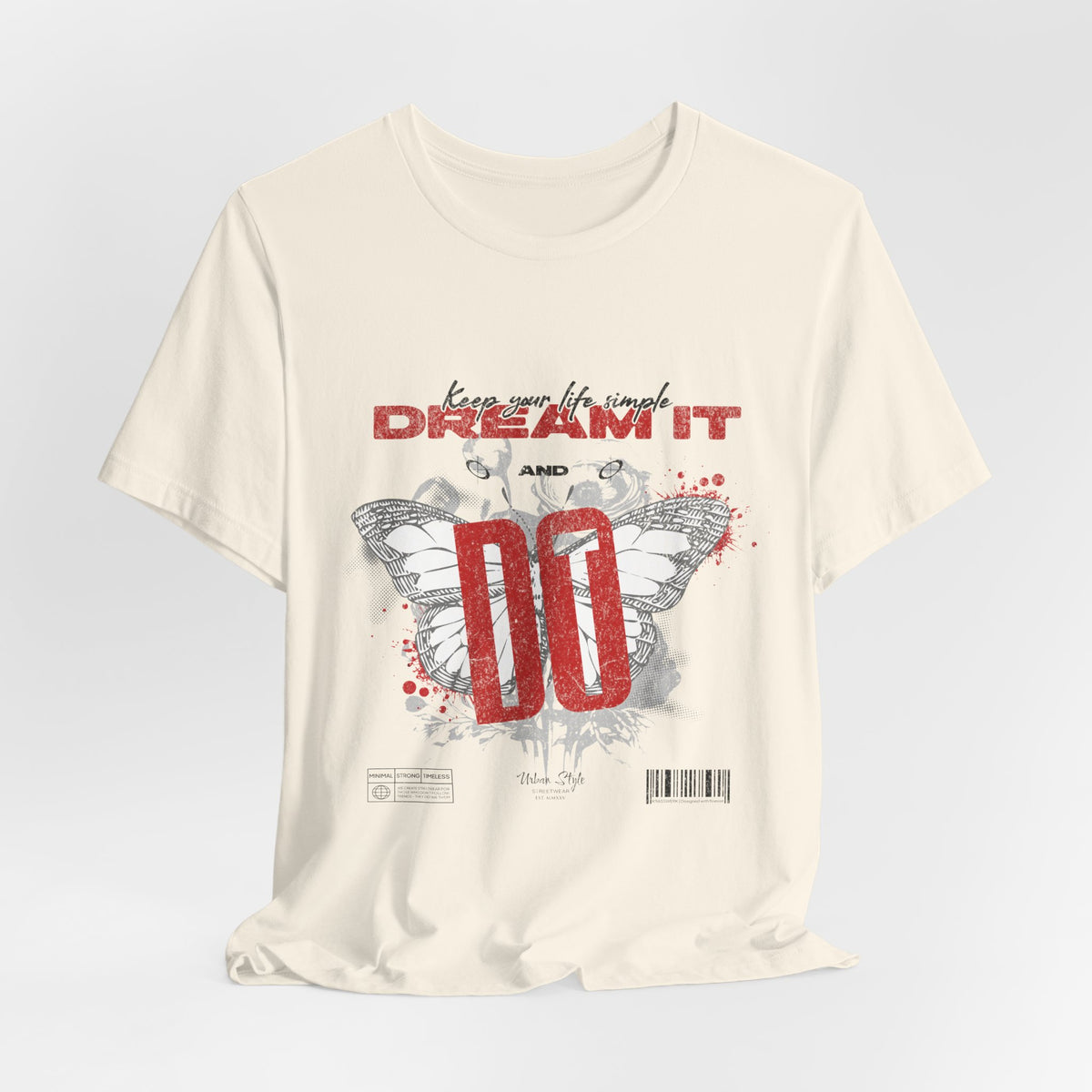 The DREAM IT DO IT t-shirt in Natural — soft off-white tone with organic vibes, mellowing the visual punch.