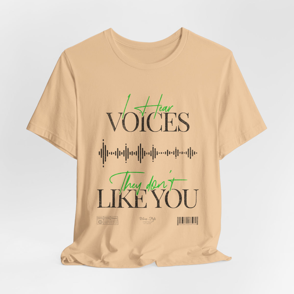 The VOICES t-shirt in Sand Dune — dry murmurs drifting through forgotten corners of the mind.