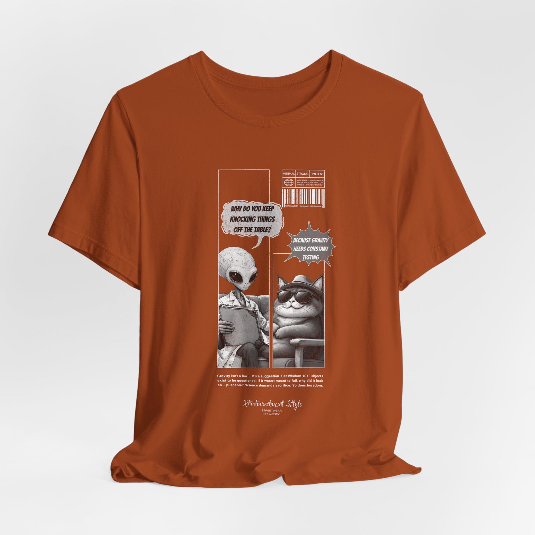 The GRAVITY t-shirt in Autumn — 3D mockup showing the shirt in autumn orange. No background, no model, comic design visible on chest.