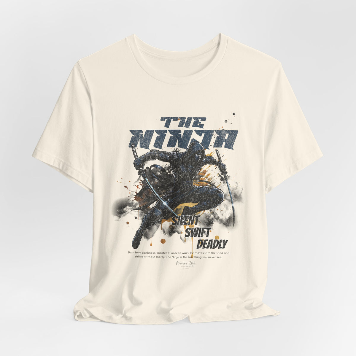 The NINJA t-shirt in Natural — like bare footsteps on stone — quiet and exact.