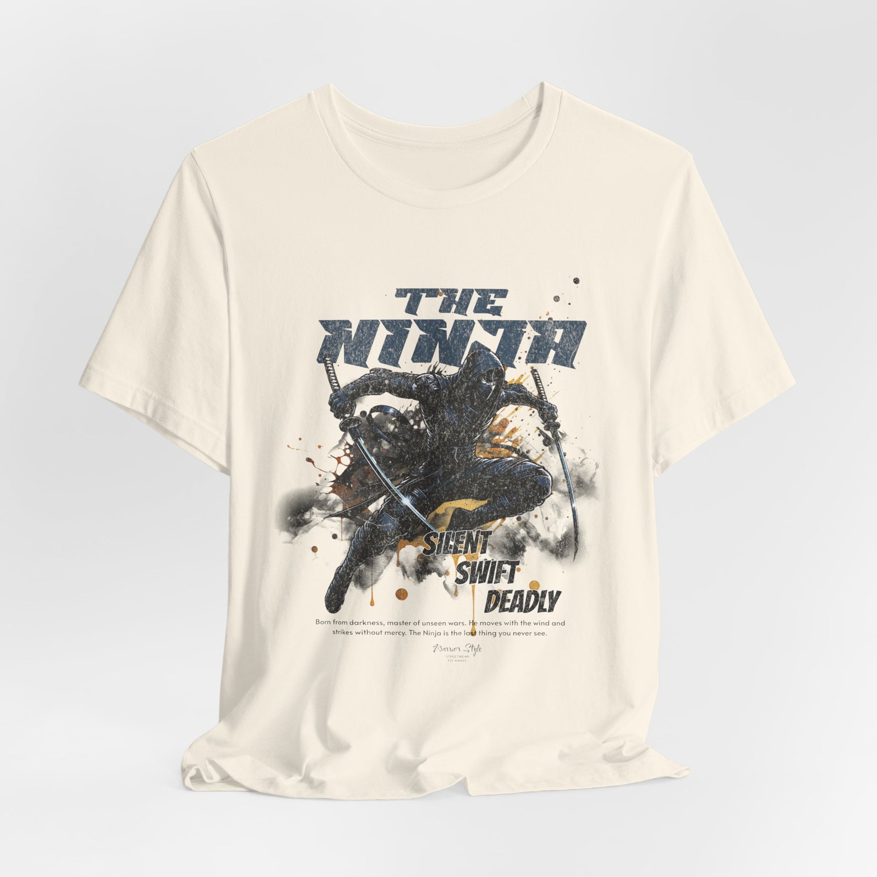 The NINJA t-shirt in Natural — like bare footsteps on stone — quiet and exact.
