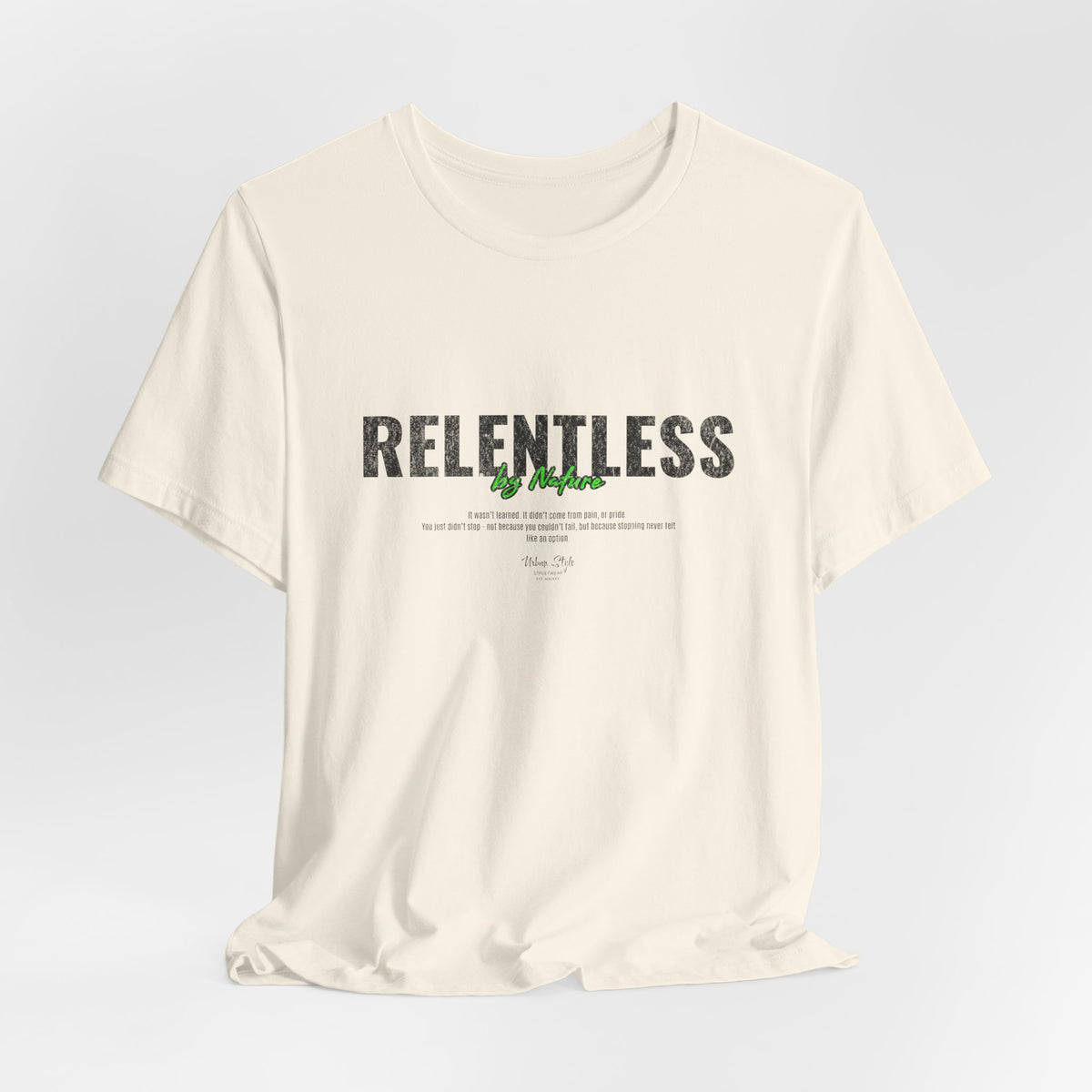 The RELENTLESS t-shirt in Natural — calm surface, unstoppable current.