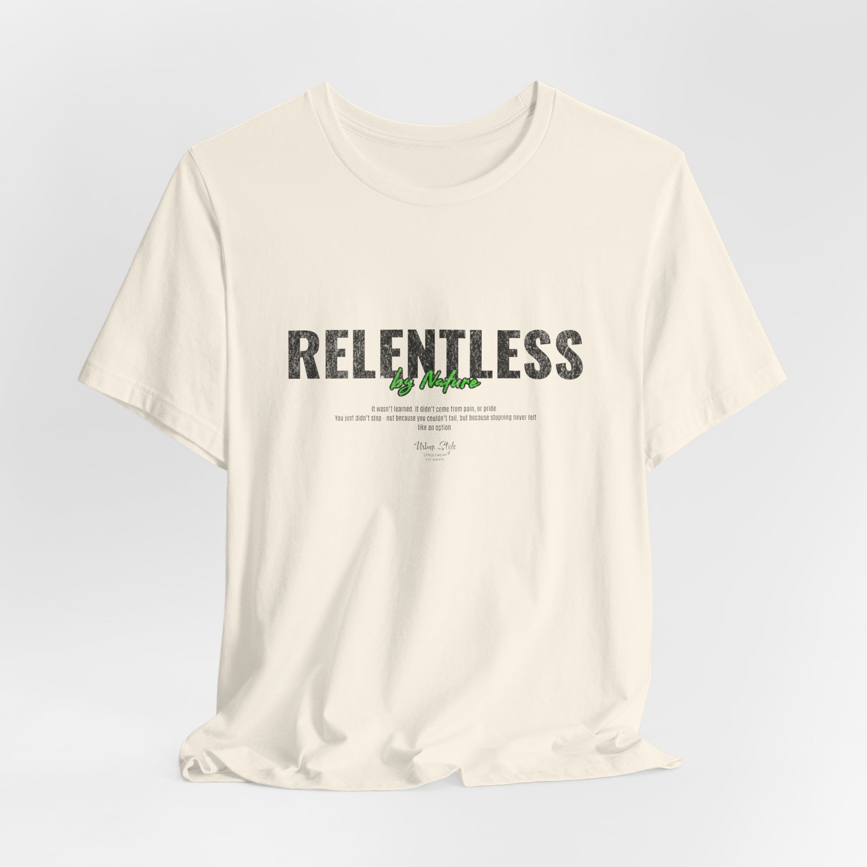 The RELENTLESS t-shirt in Natural — calm surface, unstoppable current.