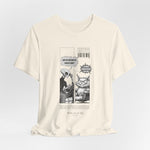 The NAP – 18h A Day t-shirt in Natural — Soft off-white background blends with the comic linework for a minimal aesthetic.