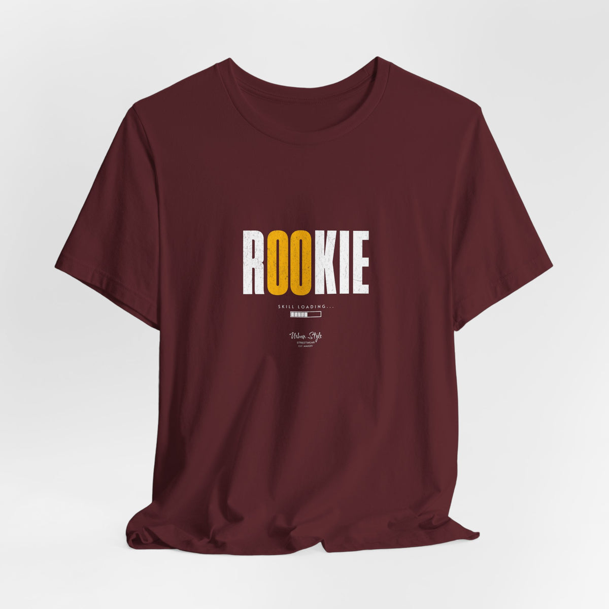 The ROOKIE t-shirt in Maroon — unsure footing, but a fire growing inside.