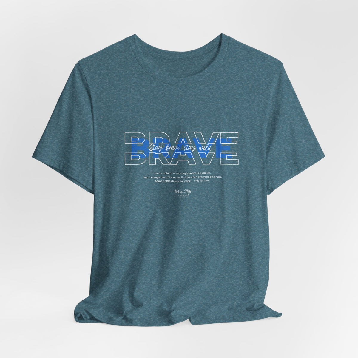 The BRAVE t-shirt in Heather Deep Teal — calm intensity with sharp depth.