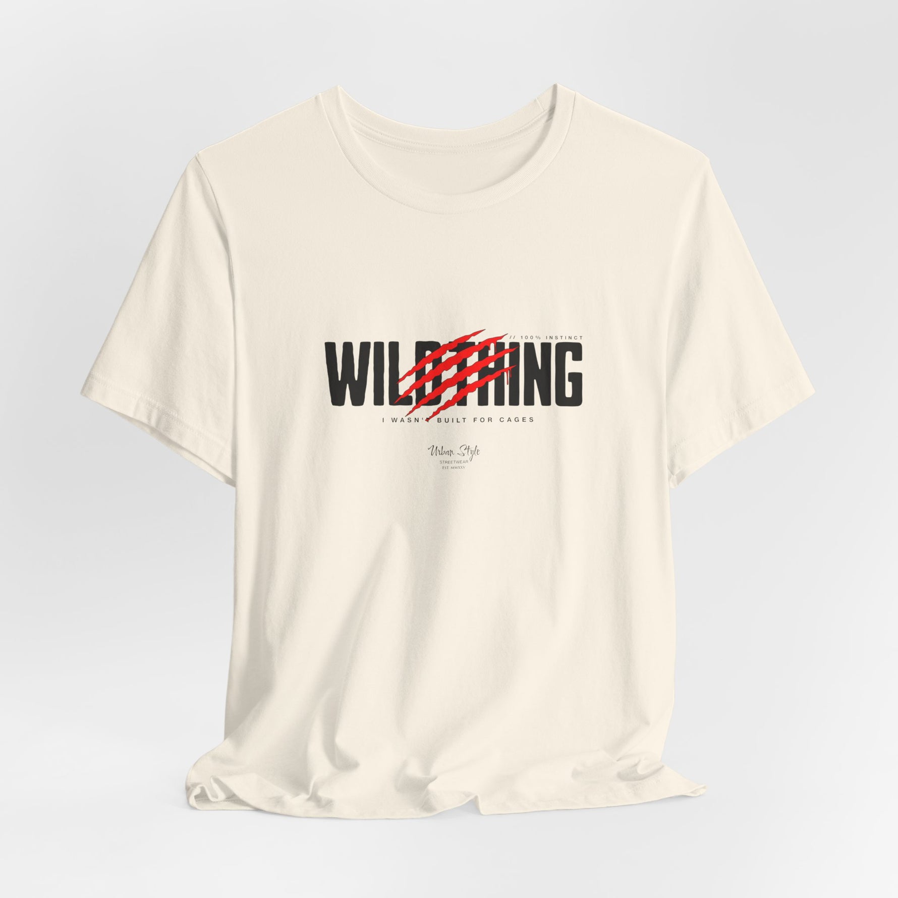 The WILDTHING t-shirt in Natural — Soft vintage white creates a quiet contrast to the wild.