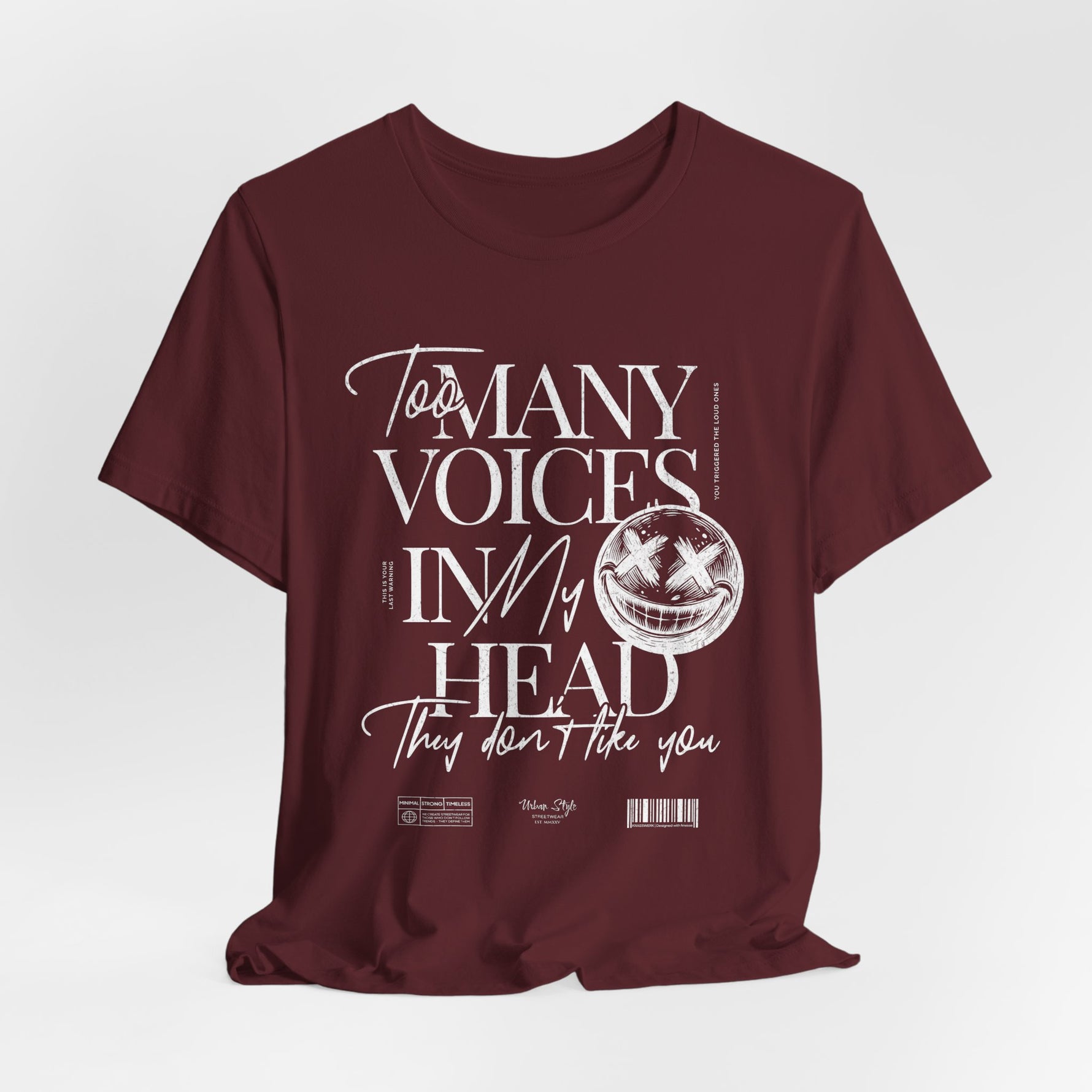 The MANY VOICES t-shirt in Maroon — Deep and uneasy — like thoughts you can't shut off.