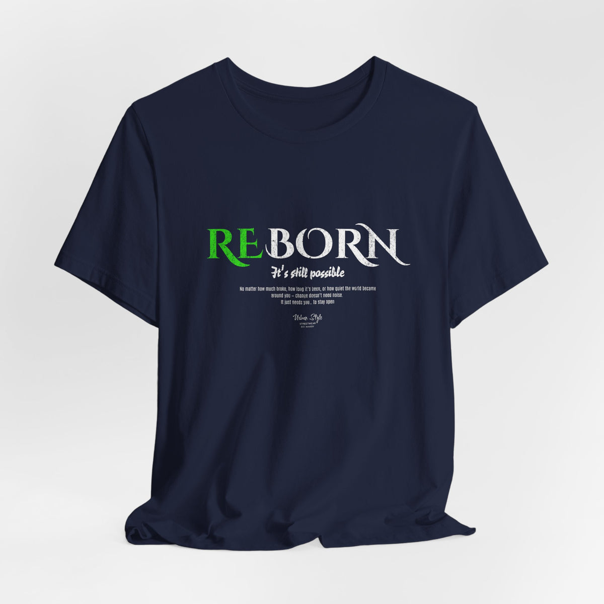 The REBORN t-shirt in Navy — deep healing wrapped in quiet depth.