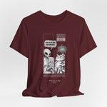 The TO RULE t-shirt in Maroon — rich maroon tones offer a dramatic backdrop for the comic artwork.
