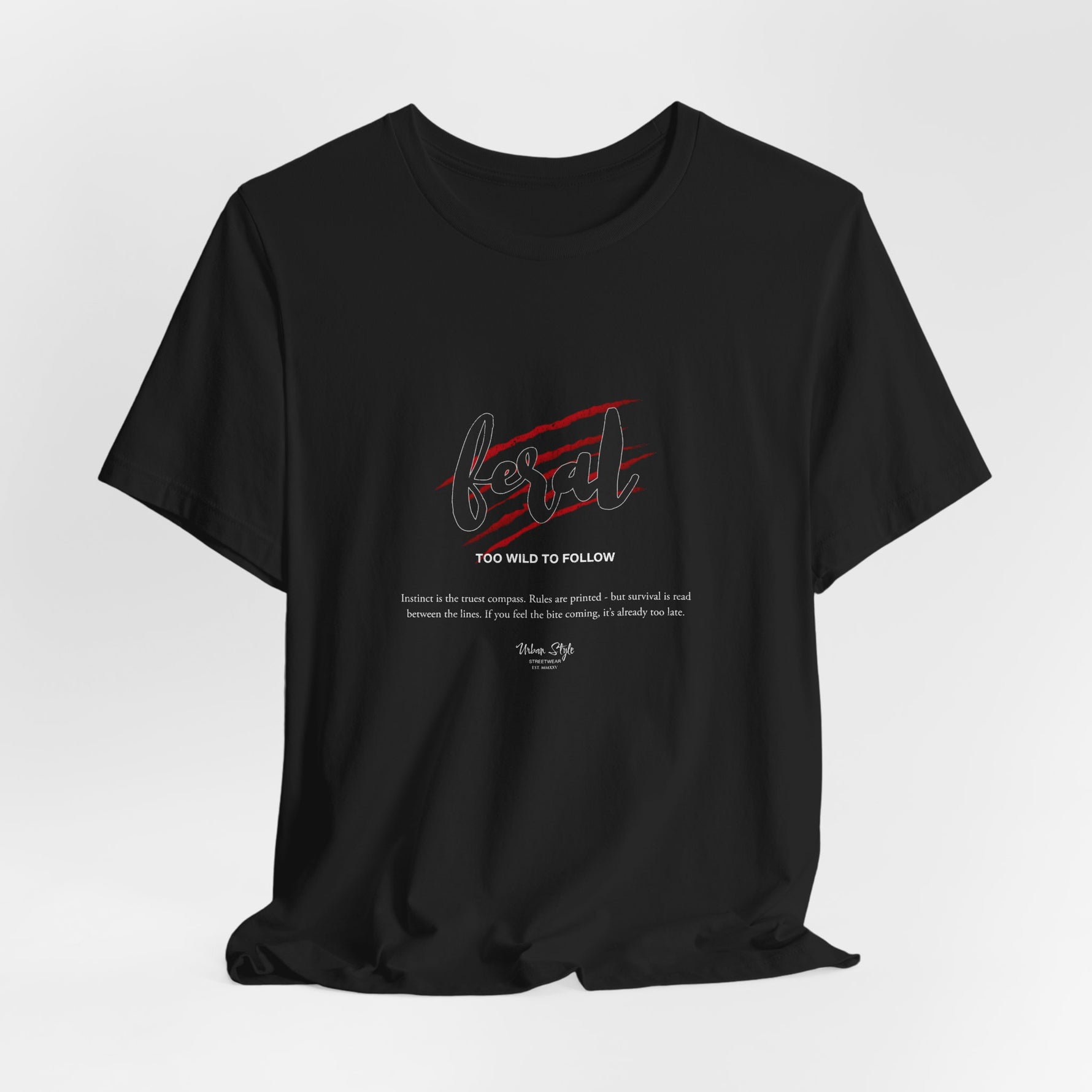 The FERAL t-shirt in Black — where instinct meets darkness. A warning wrapped in shadows.