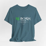 The REBORN t-shirt in Heather Deep Teal — rebirth in still waters, where silence reshapes strength.