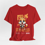 The FEED ME t-shirt in red — loud, fearless, and impossible to ignore — just like mealtime tantrums.