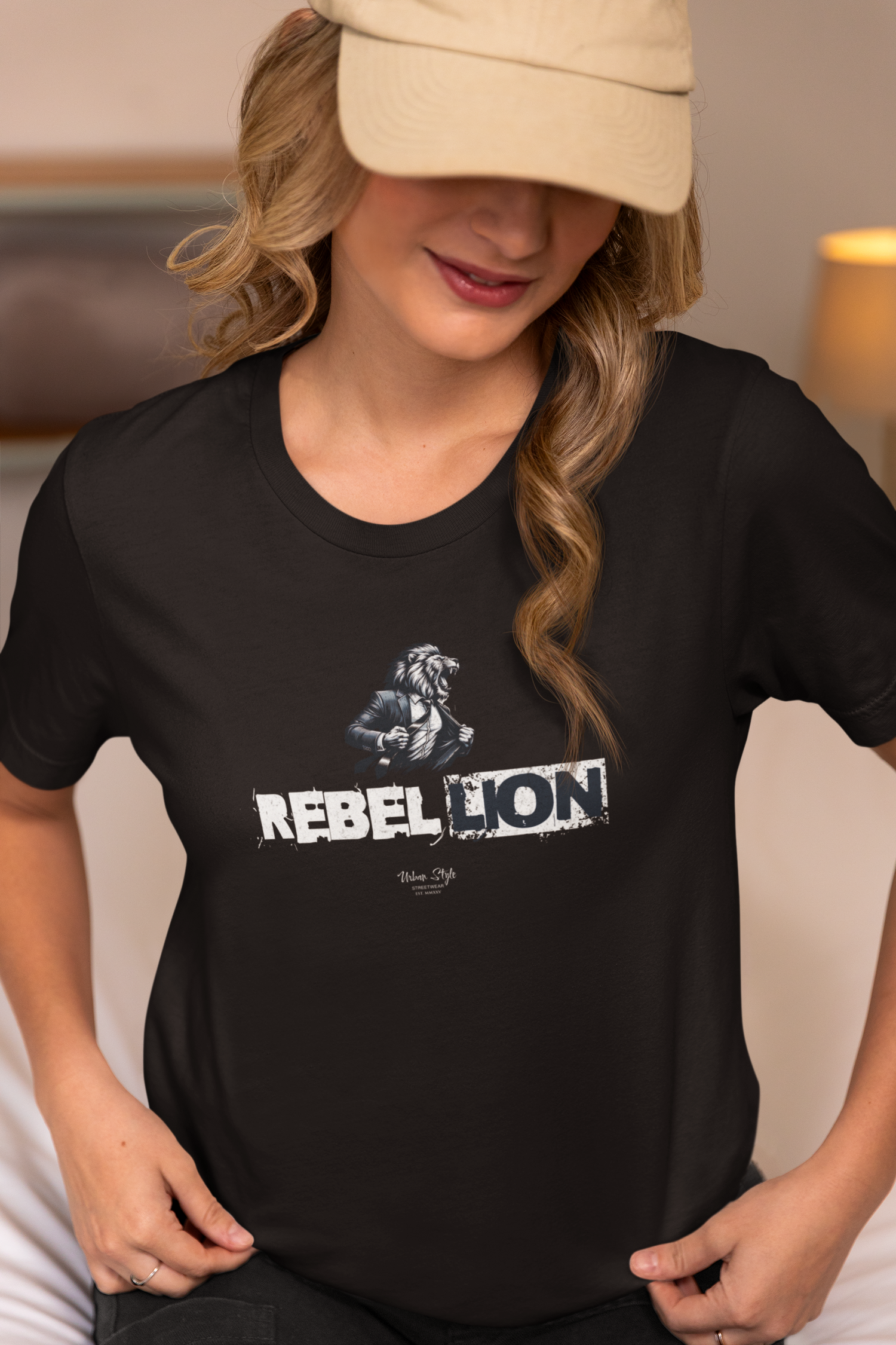 REBELLION black tee by KRASSWERK – worn by female model in casual indoor setting, close-up view with soft lighting and relaxed pose