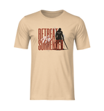 “No Retreat No Surrender” sanddune tee by KRASSWERK – isolated ghost mockup showing bold typography and lone warrior silhouette with sword, no background or model