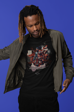 “JIN” black tee by KRASSWERK – worn by male model in streetwear jacket with blue backdrop, samurai-inspired warrior graphic symbolizing strength and compassion