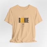 The ROOKIE t-shirt in Sand Dune — fresh boots in shifting ground.