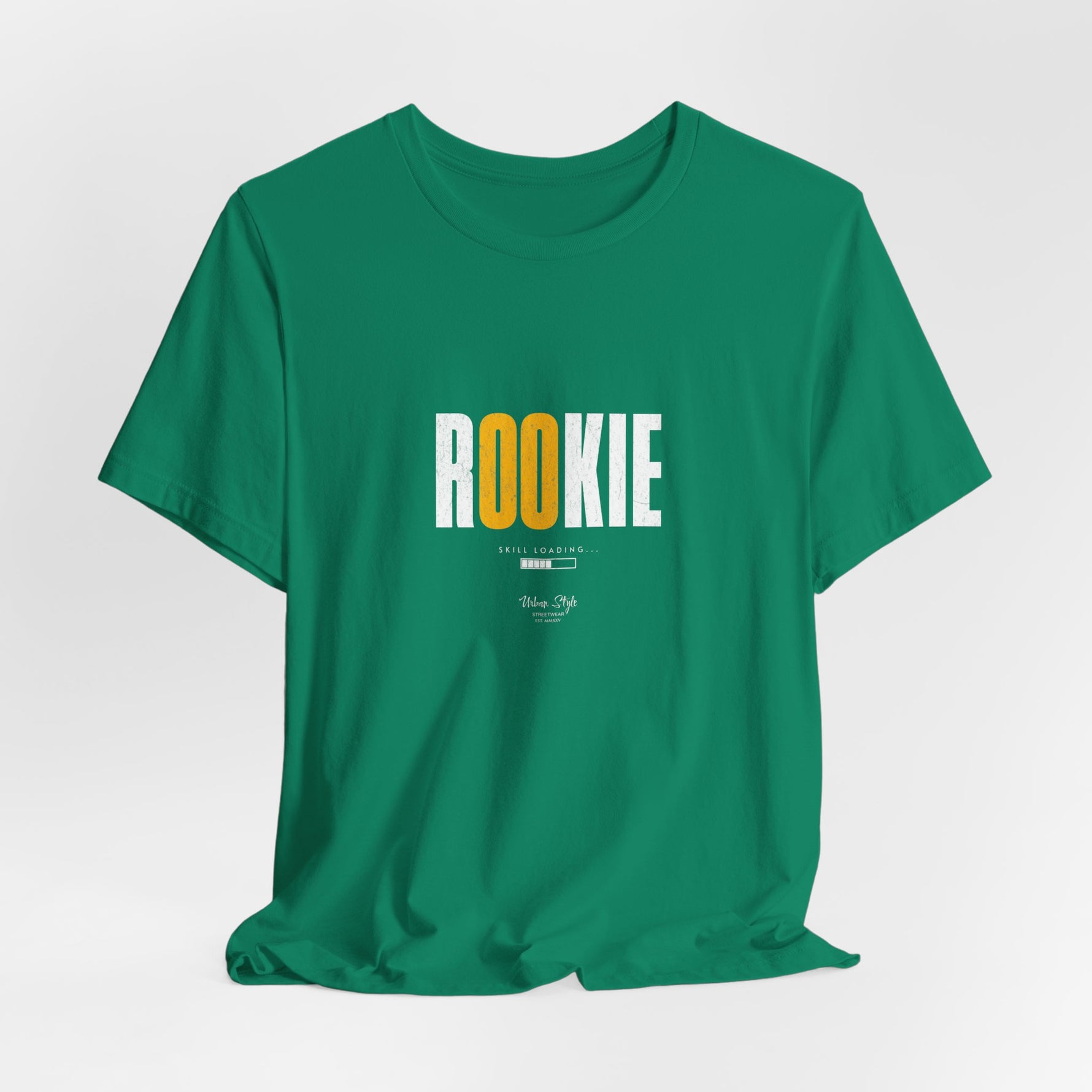 The ROOKIE t-shirt in Kelly — fresh energy, ready to learn everything the hard way.
