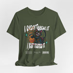 The I Just Tested It t-shirt in military green — a gritty, tactical green that adds a rough charm to the playful destruction.