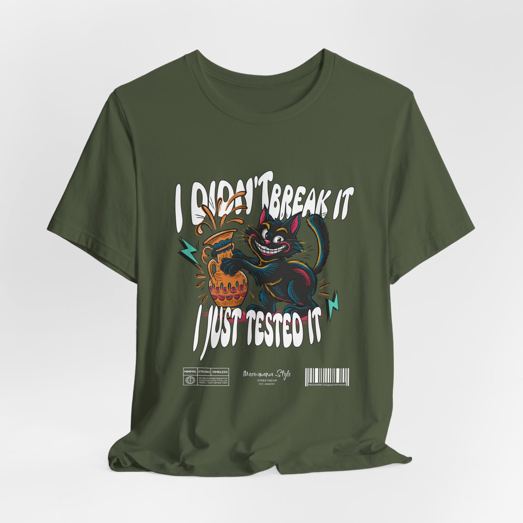 The I Just Tested It t-shirt in military green — a gritty, tactical green that adds a rough charm to the playful destruction.