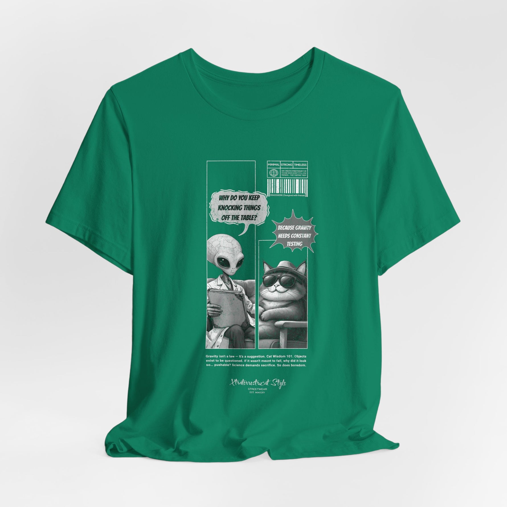 The GRAVITY t-shirt in Kelly — 3D mockup of vivid green shirt with detailed comic print. No background, no human figure.