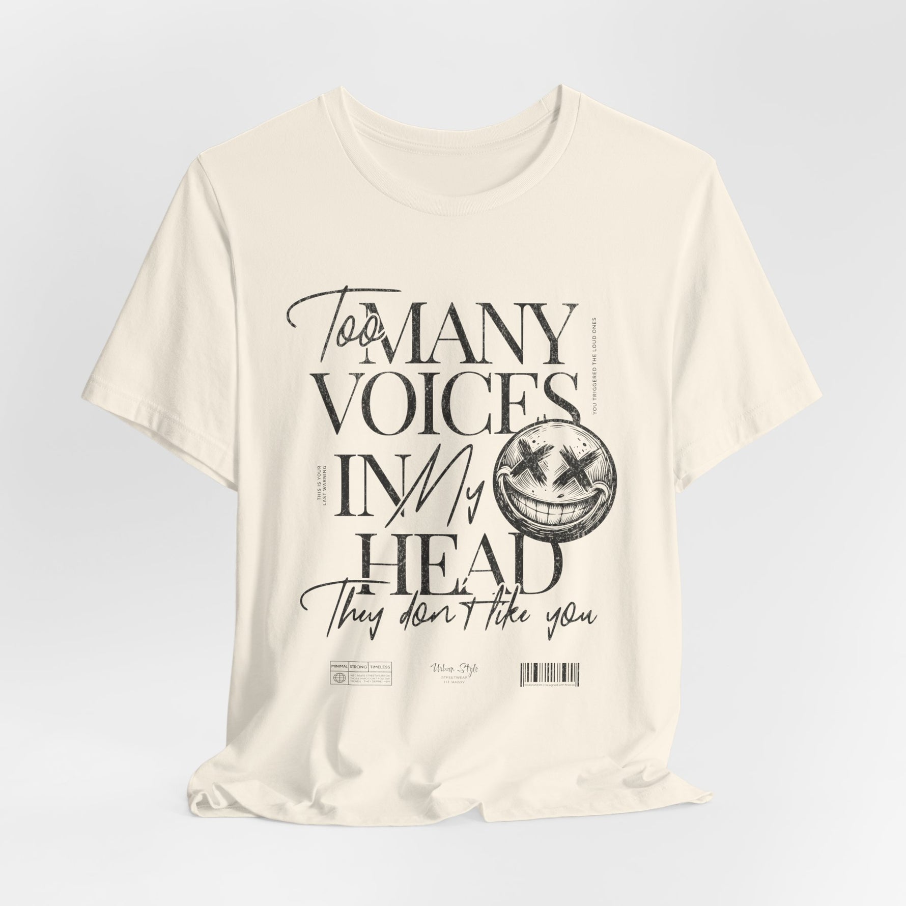The MANY VOICES t-shirt in Natural — A soft disguise for sharp thoughts.