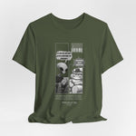 The Satisfiction t-shirt in military green — 3D mockup showing a desaturated olive green shirt. No background or model.