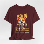 The FEED ME t-shirt in maroon — deep, dramatic, and full of consequence.