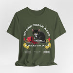 The No One Tells a Cat t-shirt in militarygreen — ghost mockup showing an olive green tone with no background or model.