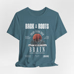The Back to the Roots t-shirt in Heather Deep Teal — ancient depth, modern breath.