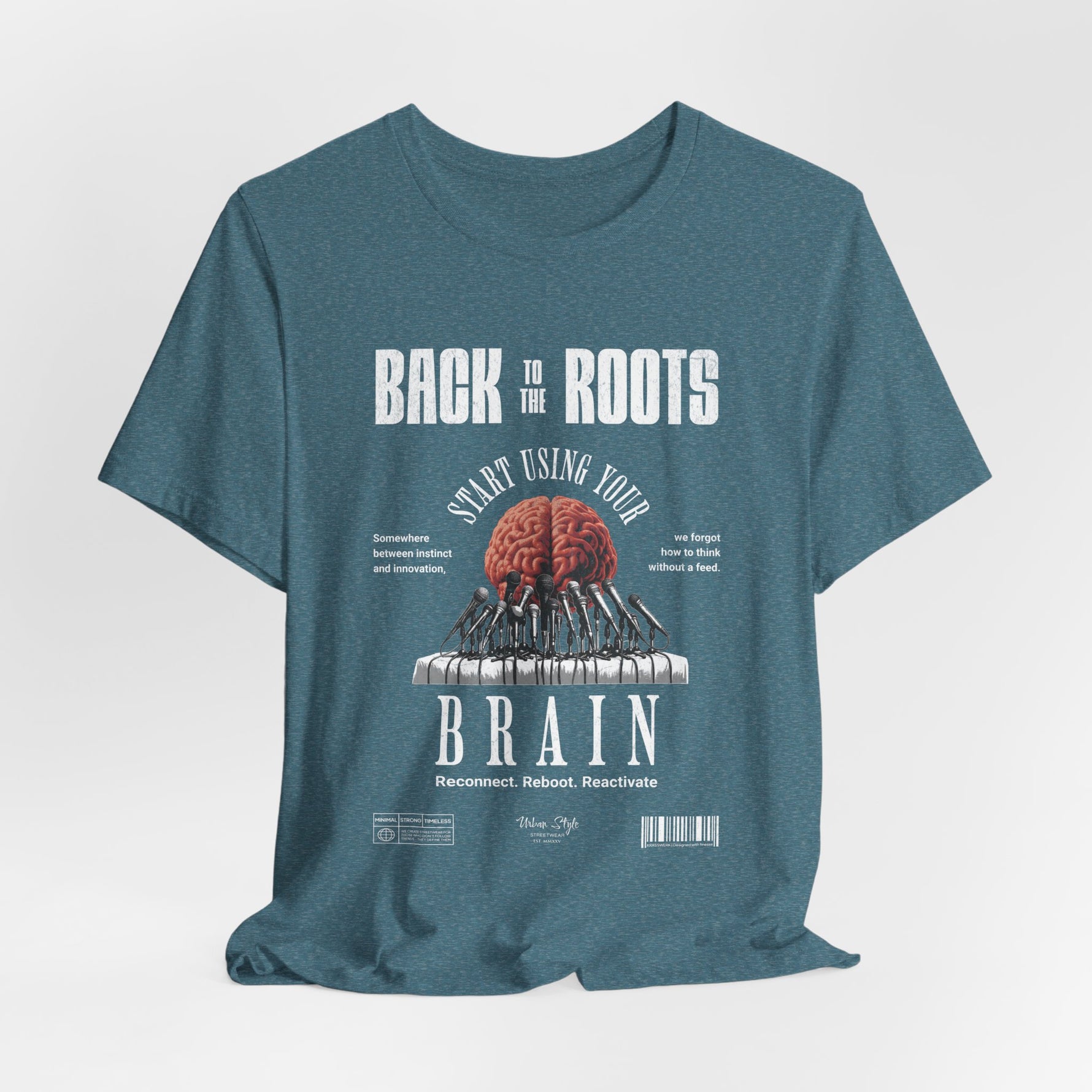 The Back to the Roots t-shirt in Heather Deep Teal — ancient depth, modern breath.