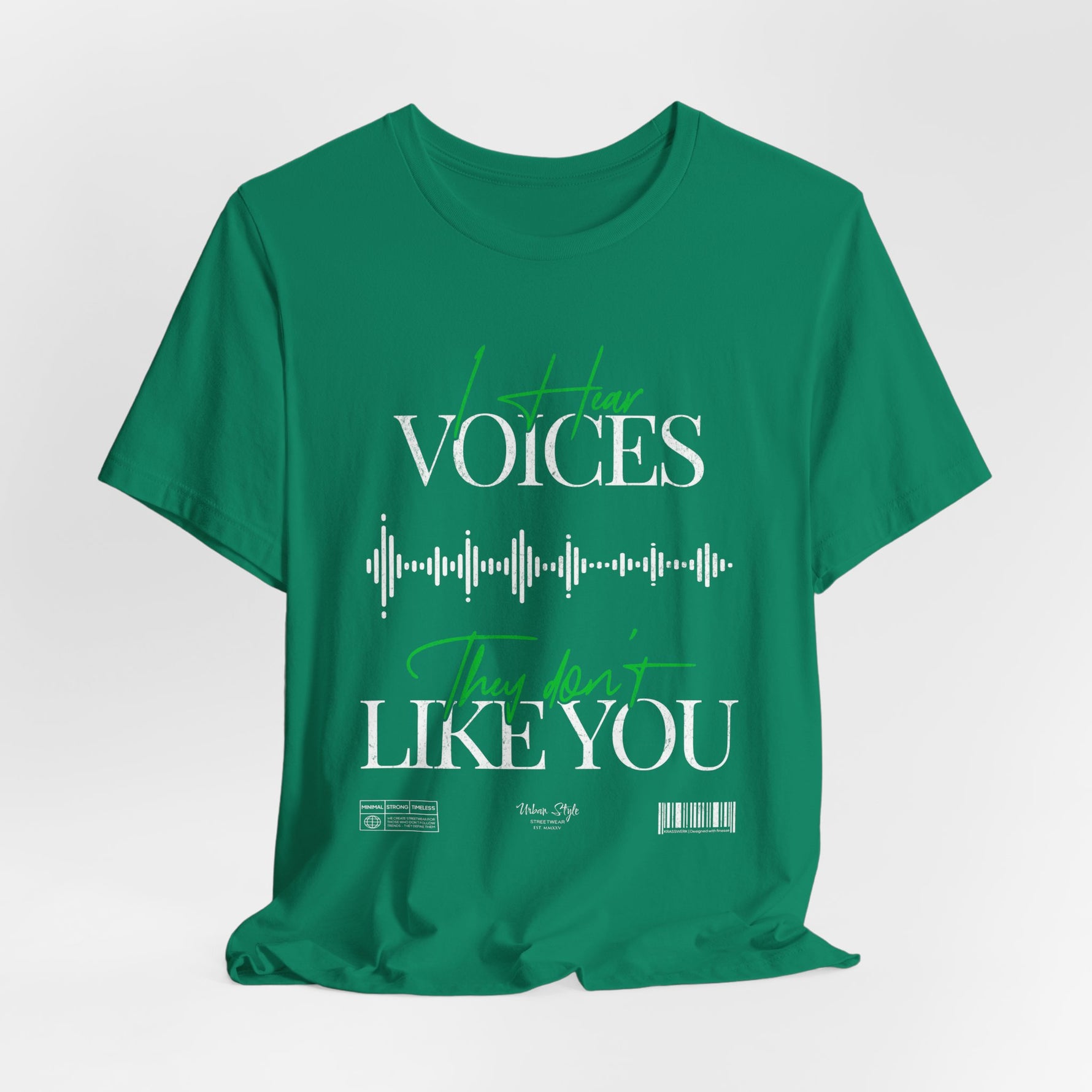 The VOICES t-shirt in Kelly — vibrant and eerie, like a voice too cheerful to trust.