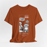 The MEOW 3AM t-shirt in Autumn — 3D mockup showing a warm, burnt orange tone shirt with no background or model.