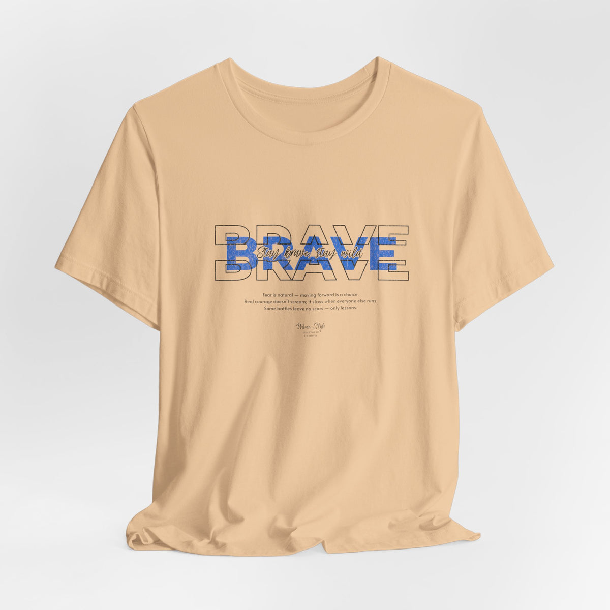 The BRAVE t-shirt in Sand Dune — desert resolve, shaped by storms.