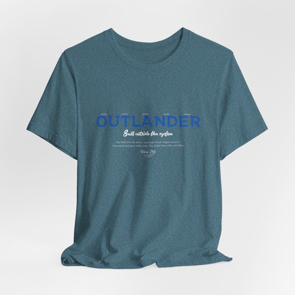 The OUTLANDER t-shirt in Heather Deep Teal — cool logic with rogue clarity.